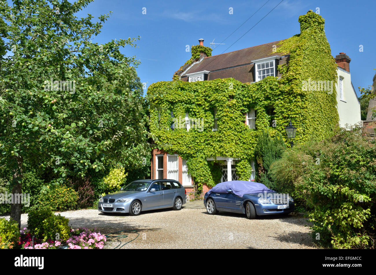 Ivy covered Pond House in Hadley Green, London, UK Stock Photo