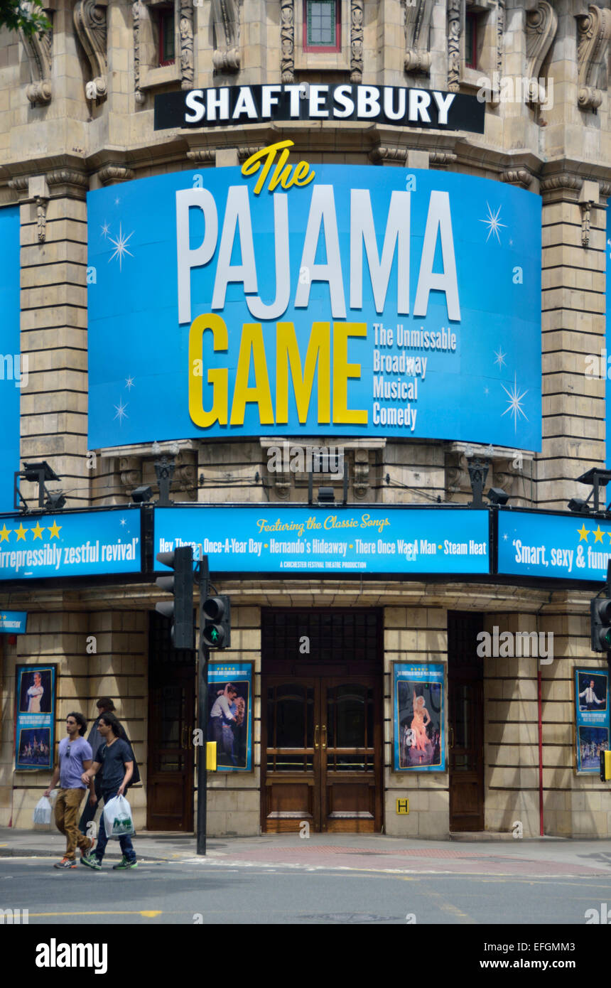 A billboard advertising the musical show Pajama Game outside the Shaftesbury Theatre in Covent Garden, London, UK Stock Photo