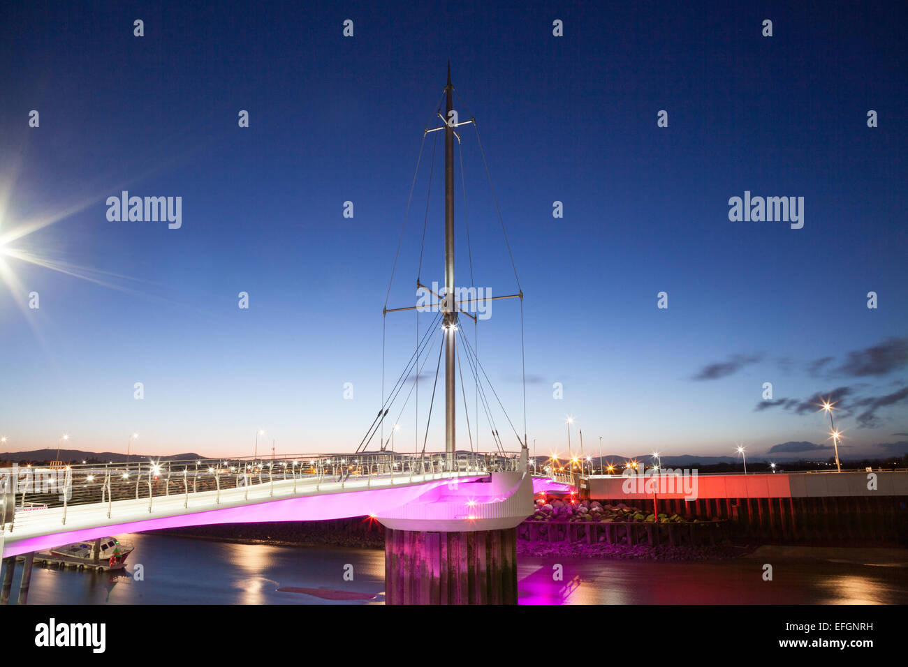 Pont y Ddraig cycle / foot bridge, Foryd Harbour, Rhyl taken at night / early morning with LED lighting Stock Photo