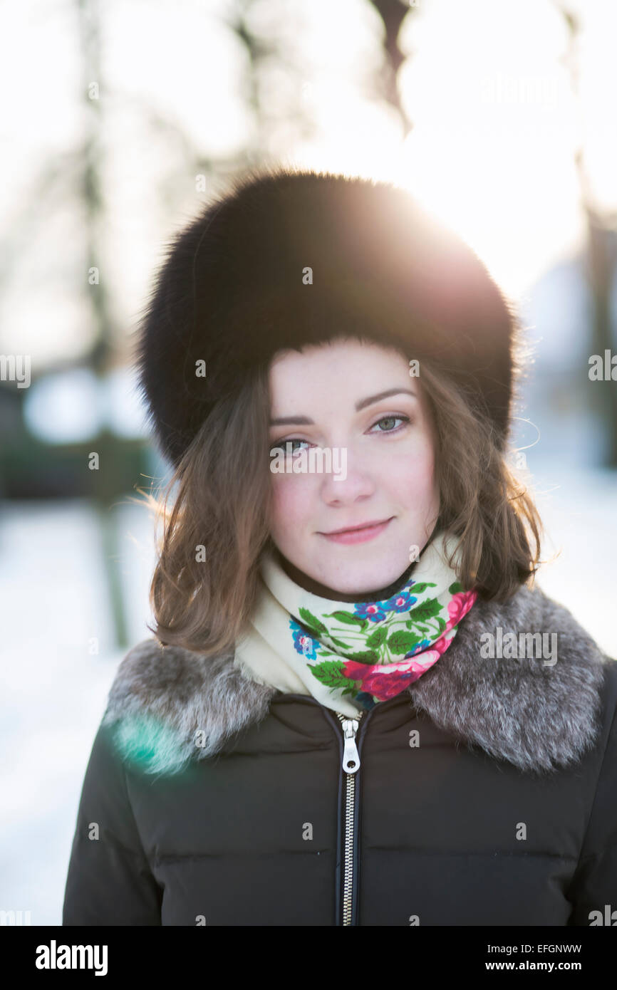 Portrait of a female in the winter park Stock Photo - Alamy
