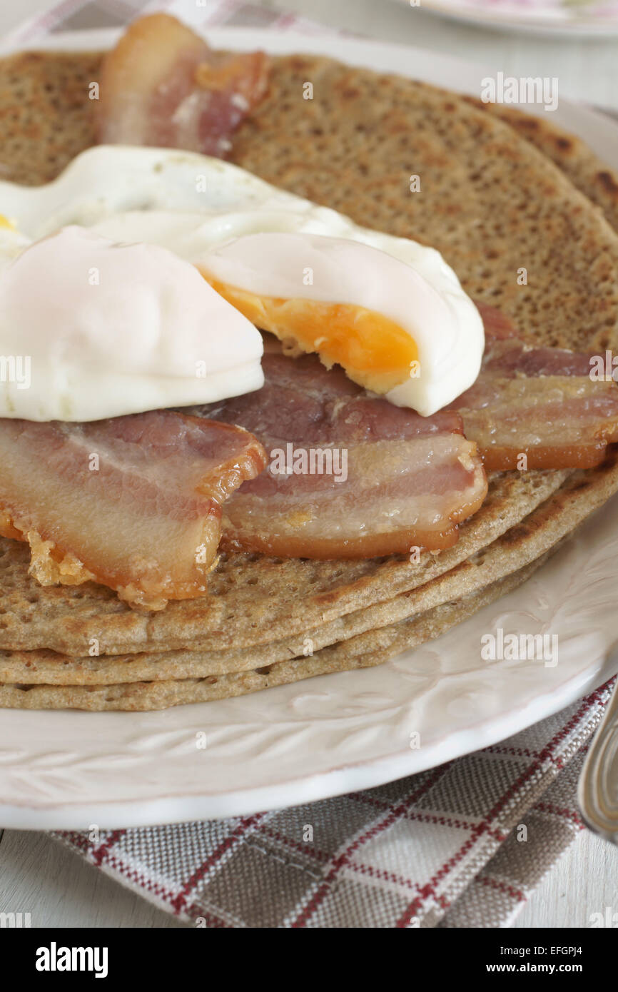 Staffordshire Oatcakes a savoury pancake with bacon and egg Stock Photo
