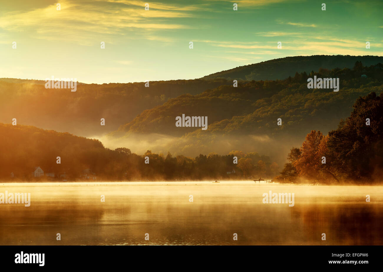 Beautiful autumn landscape, the lake in the morning fog Stock Photo - Alamy