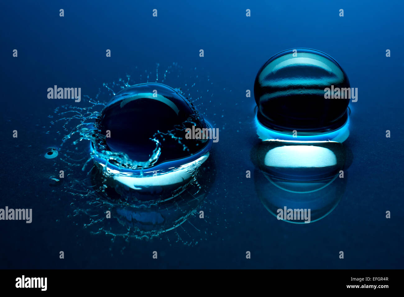 Blue crystal balls - splash in the water Stock Photo
