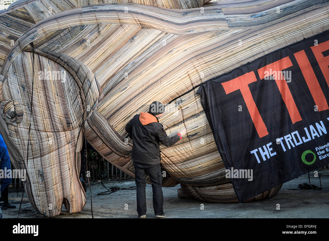 Brussels, Belgium. 04th Feb, 2015. Friends of Earth Europe aet up inflated Trojan horse as they hold the prostest against TTIP agreement in front of EU headquarters in Brussels, Belgium on 04.02.2015 Friends of Earth believe that plans to create more compatible rules between the EU and the US on chemicals, food, public services, workplace health and safety, and financial regulation as part of EU-US trade talks (TTIP) are a threat to democracy and an attempt to put the interests of big business before the protection of citizens, workers, and the environment, according to over 100 civil society  Stock Photo