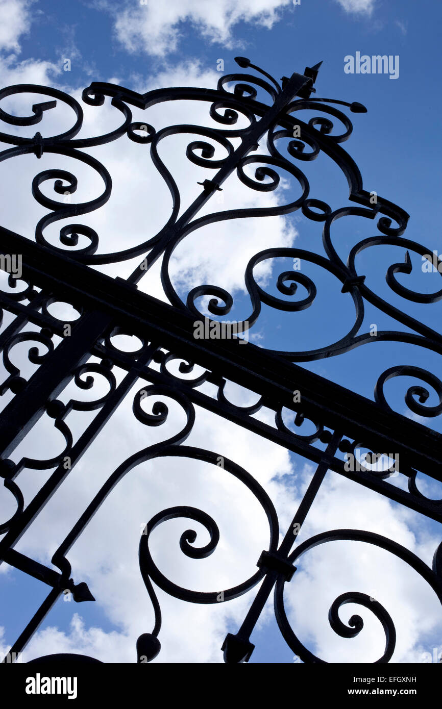Wrought iron gate, blue sky background Stock Photo