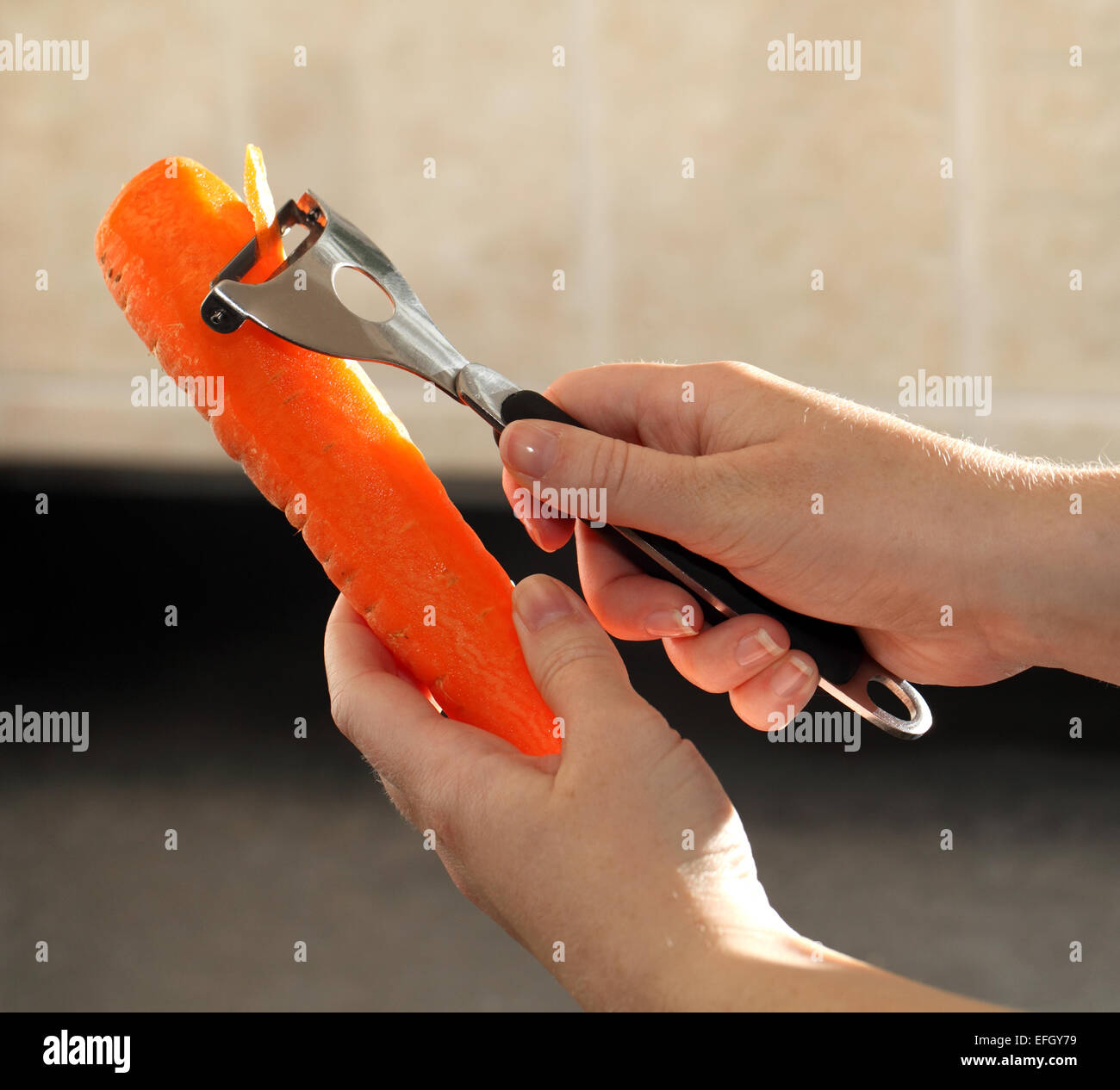 Peeling a carrot hi-res stock photography and images - Alamy