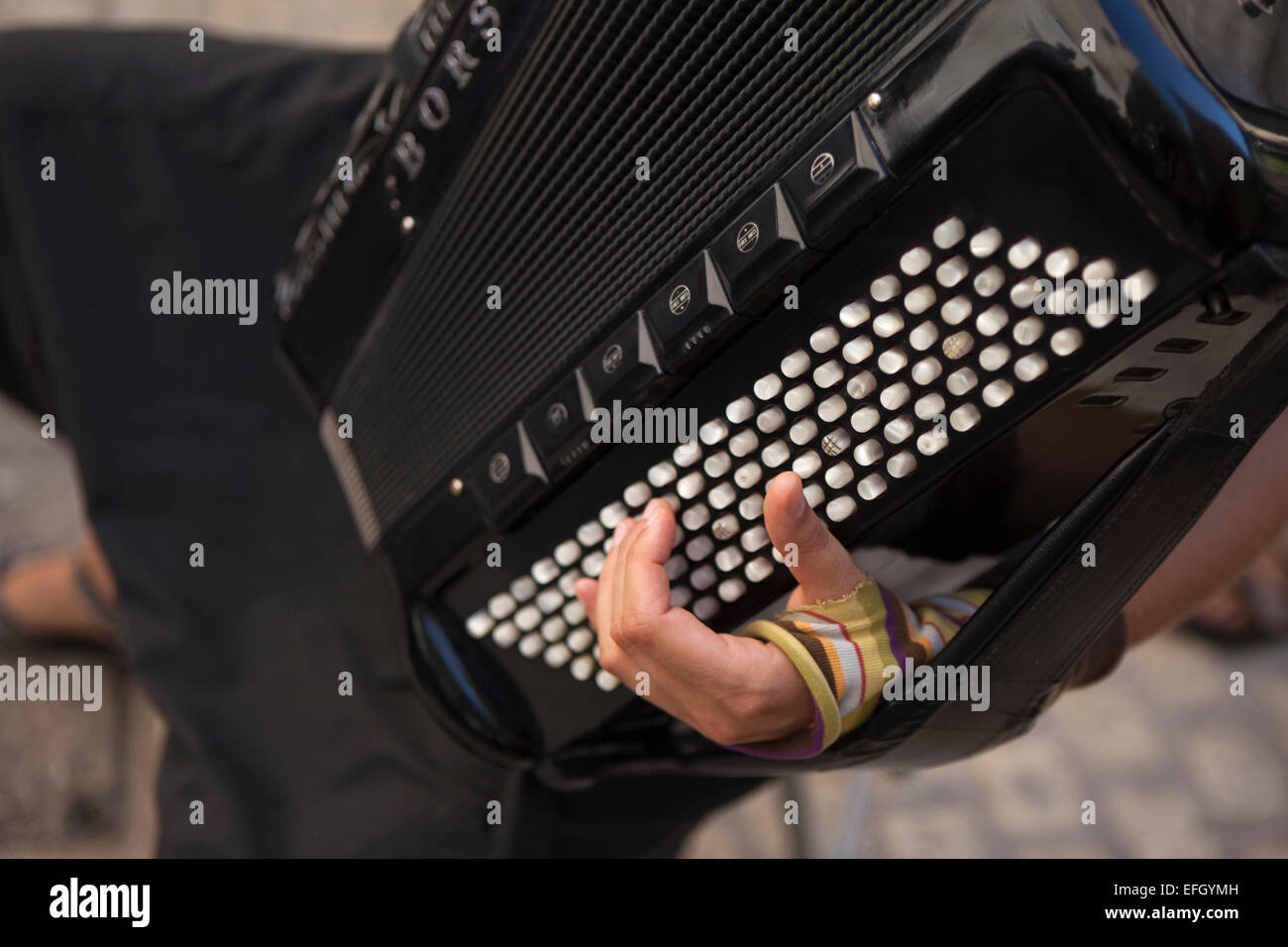 Accordionist playing in the street, France Stock Photo