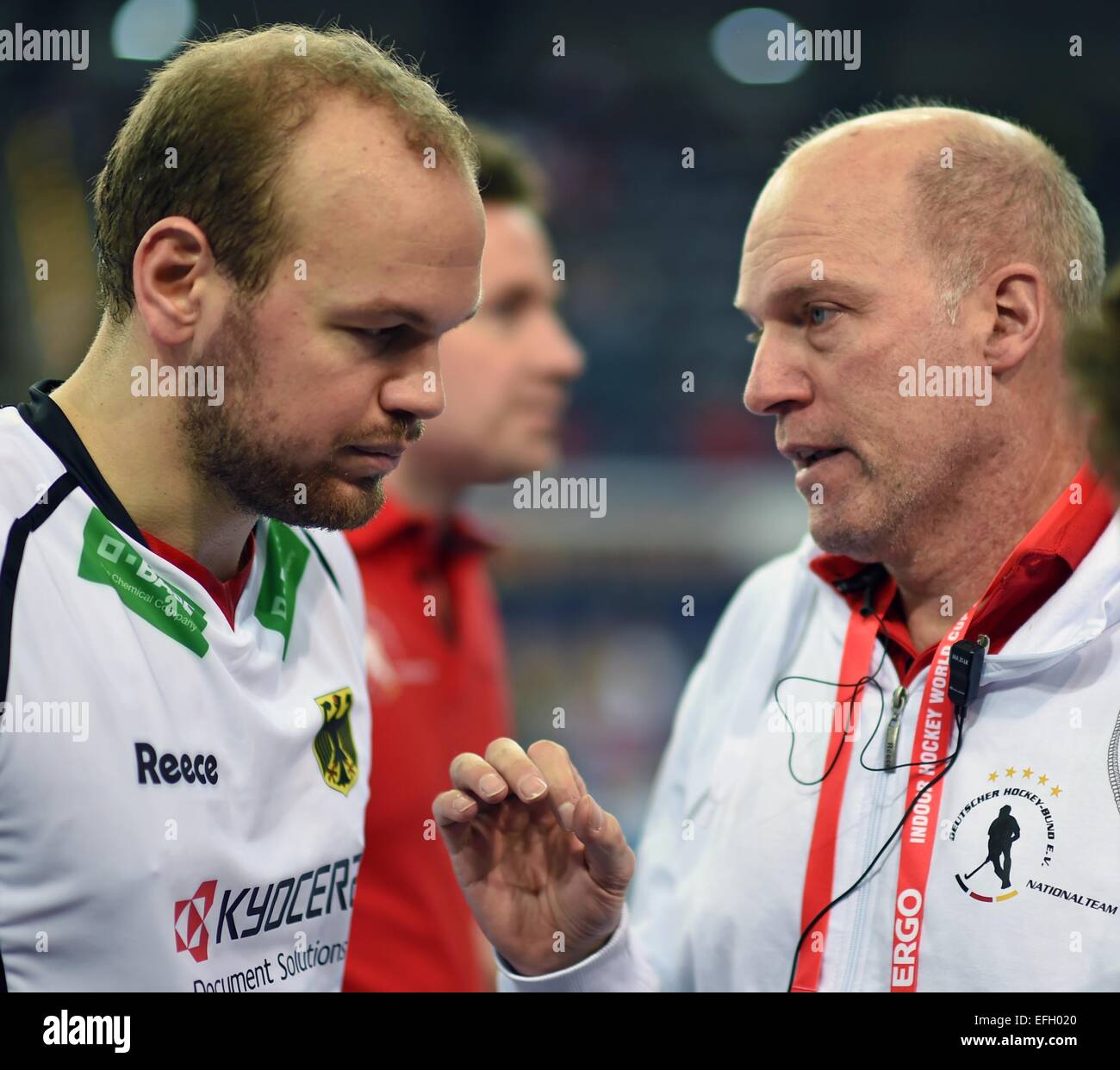 Leipzig, Germany. 04th Feb, 2015. German coach Markus Weise (R) and Thilo Stralkowski (L) analyze the game during the Men's Group A match of the Indoor Hockey World Cup in Leipzig, Germany, 04 February 2015. PHOTO: HENDRIK SCHMIDT/dpa/Alamy Live News Stock Photo
