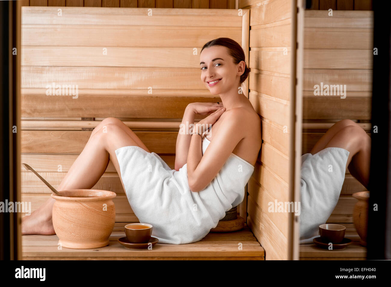 Woman in sauna Stock Photo