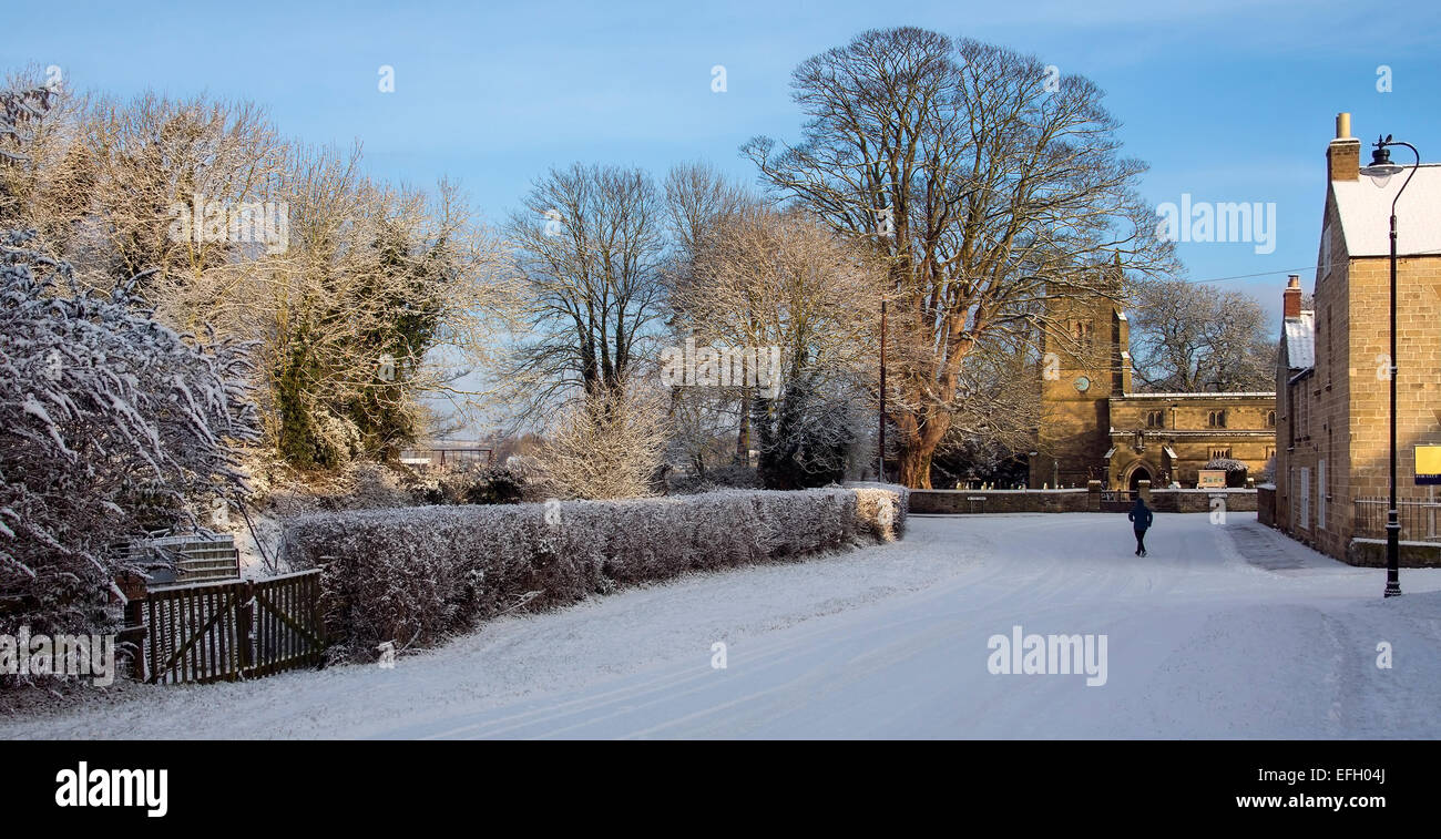 Winter snow in the small village of Slingsby in North Yorkshire in northern England Stock Photo