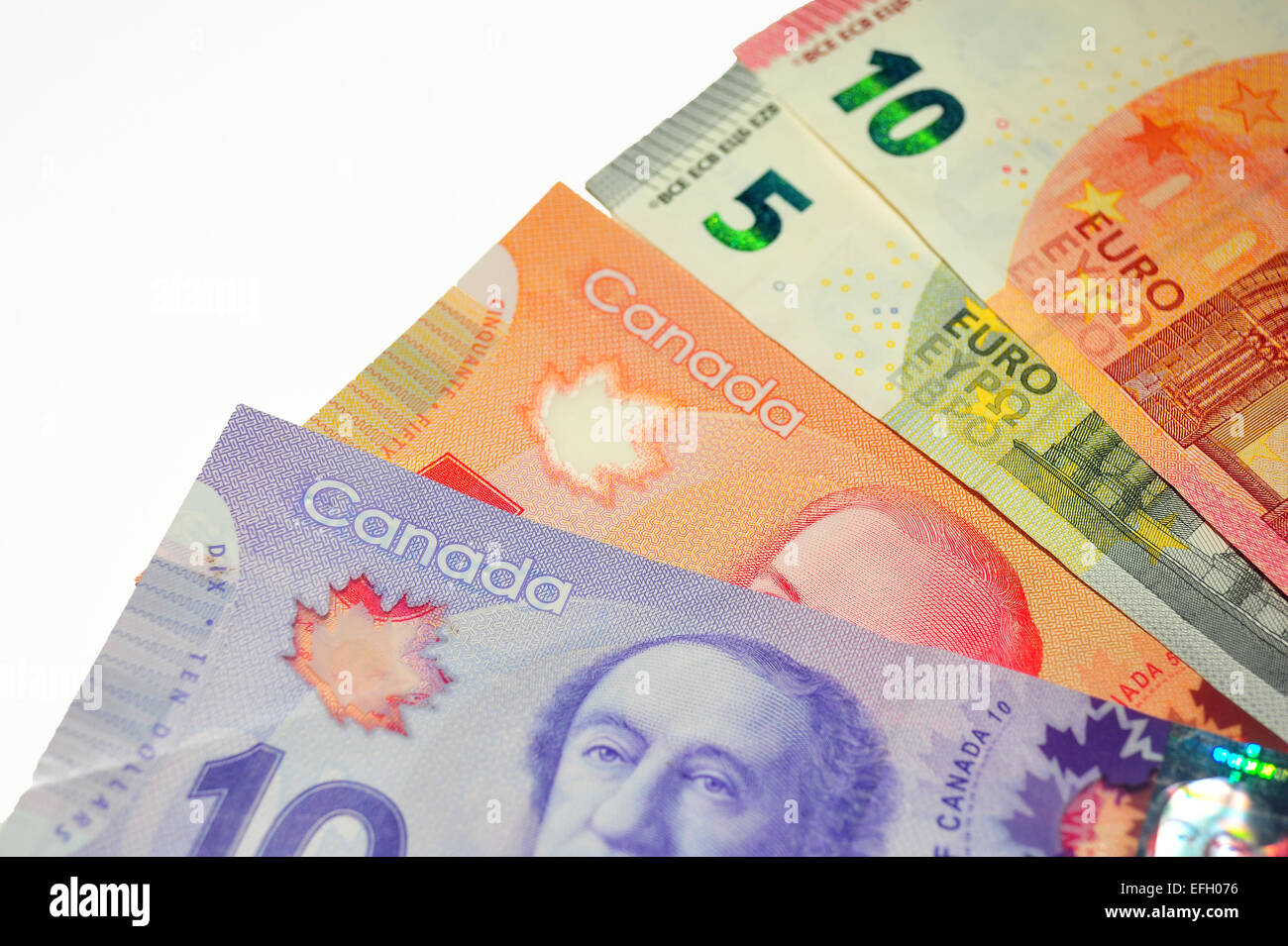 Canadian Dollar notes and European Euro notes together Stock Photo - Alamy