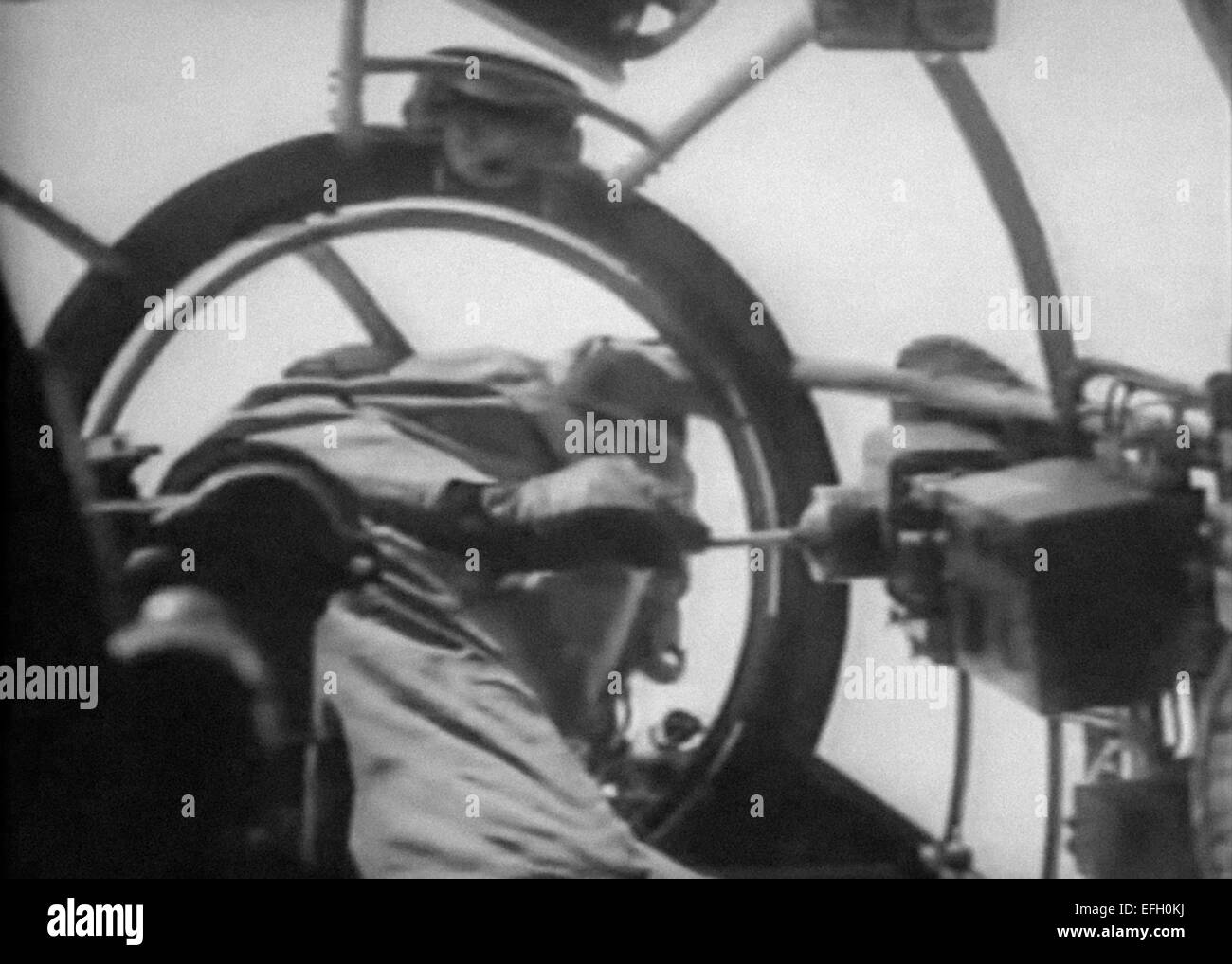 A guidance operator on board a Heinkel He 177 Greif controls a Henschel Hs 293 anti-shipping air to surface guided missile after being dropped from the aircraft during testing in December 1940. The missile powered by a  Walter HWK 109-507 rocket motor was remote controlled via radio enabling the operator to change the missile's course using a joystick. Stock Photo