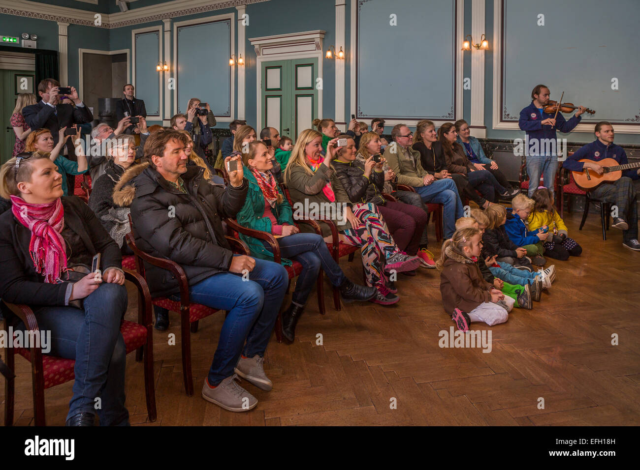 Audience taking pictures at the Idno Theater, Annual Children's Festival, Reykjavik, Iceland Stock Photo