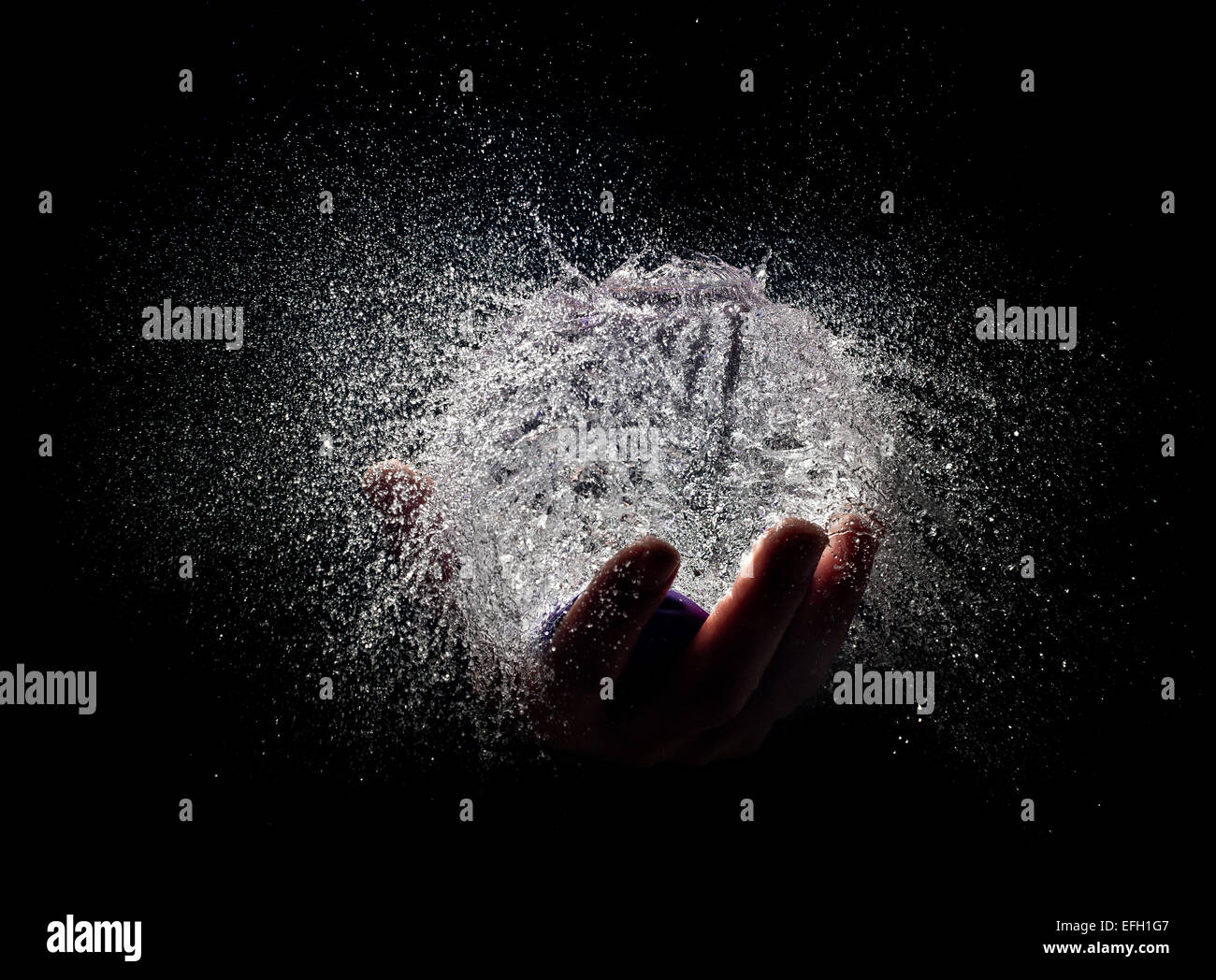 Explosion balloon full water high hi-res stock photography and images ...