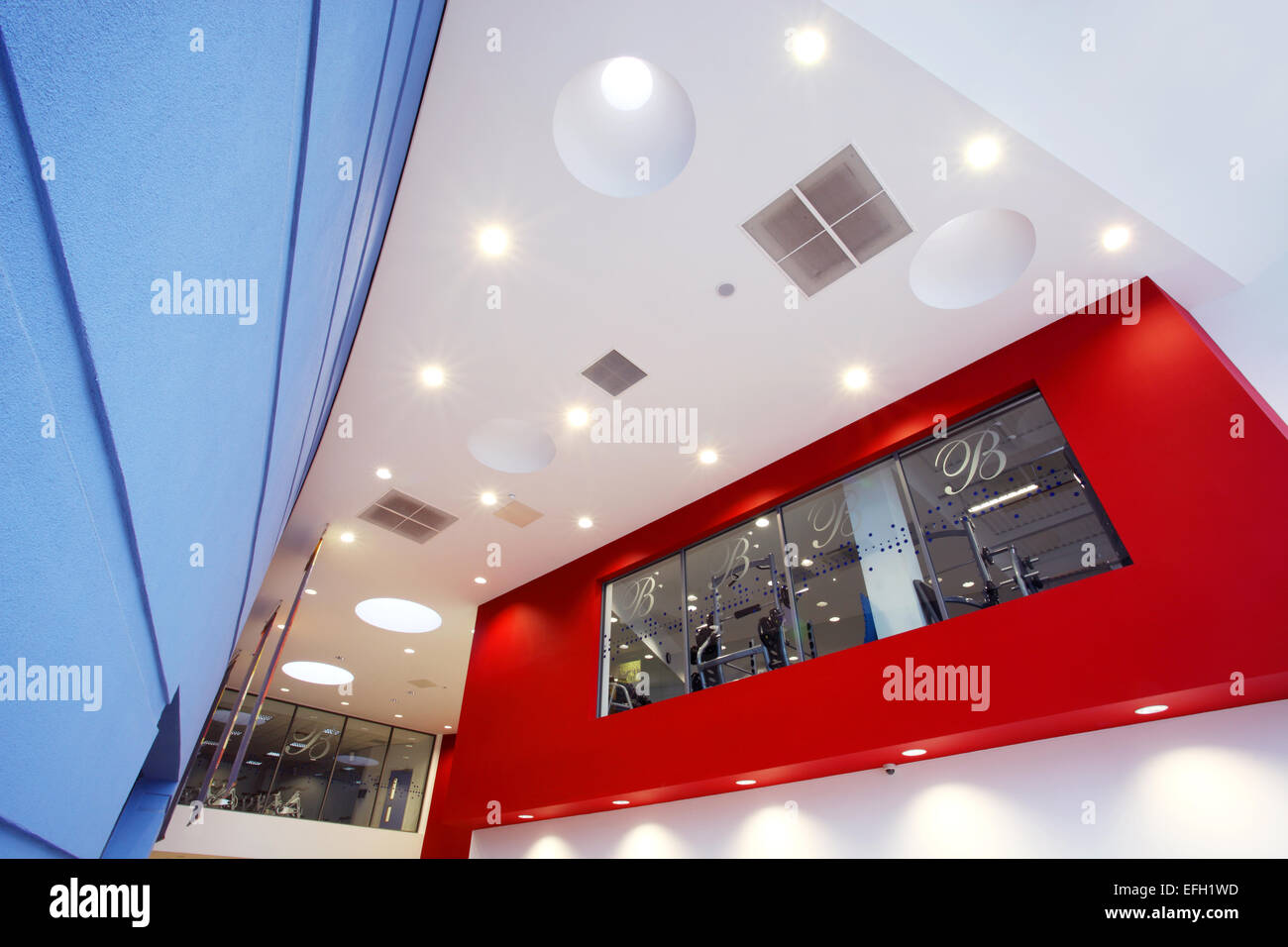 Low angle view of atrium interior in car showroom Stock Photo