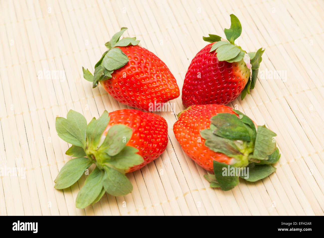 red strawberries on a wooden Stock Photo