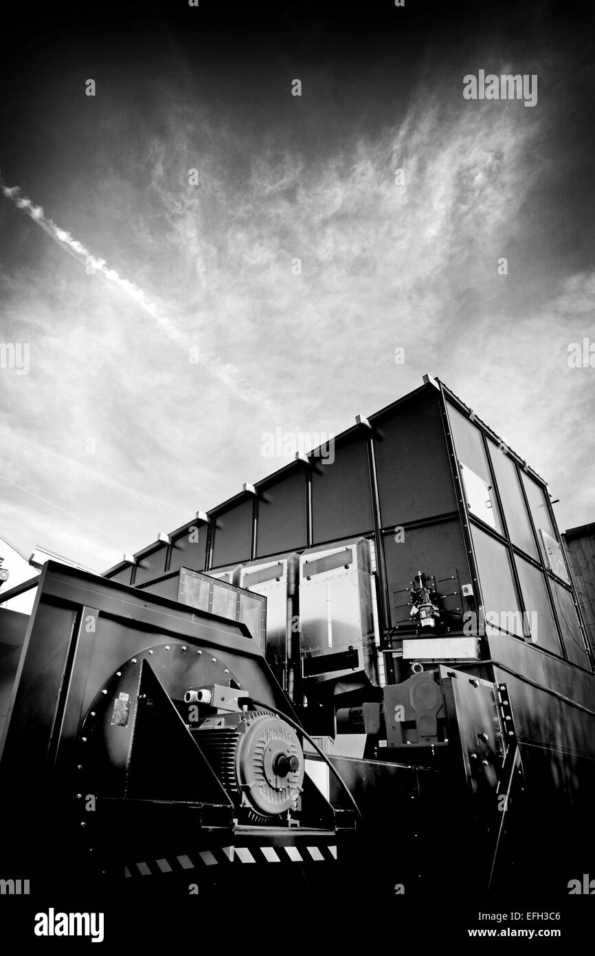 Industrial machinery outside biomass fuel plant, black & white Stock Photo