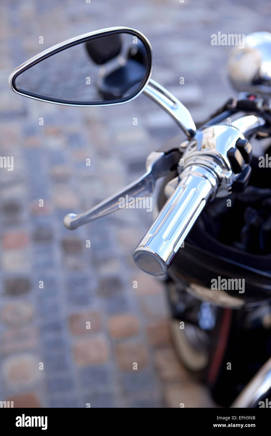 Mirror of a motorbike on a square Stock Photo Alamy
