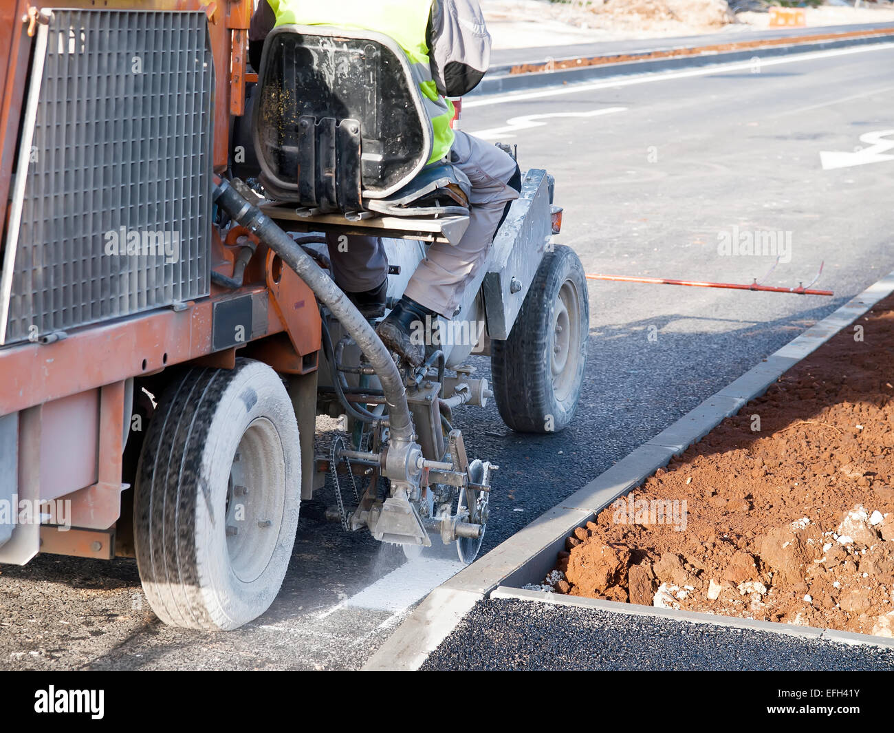 Spray road surface hires stock photography and images Alamy