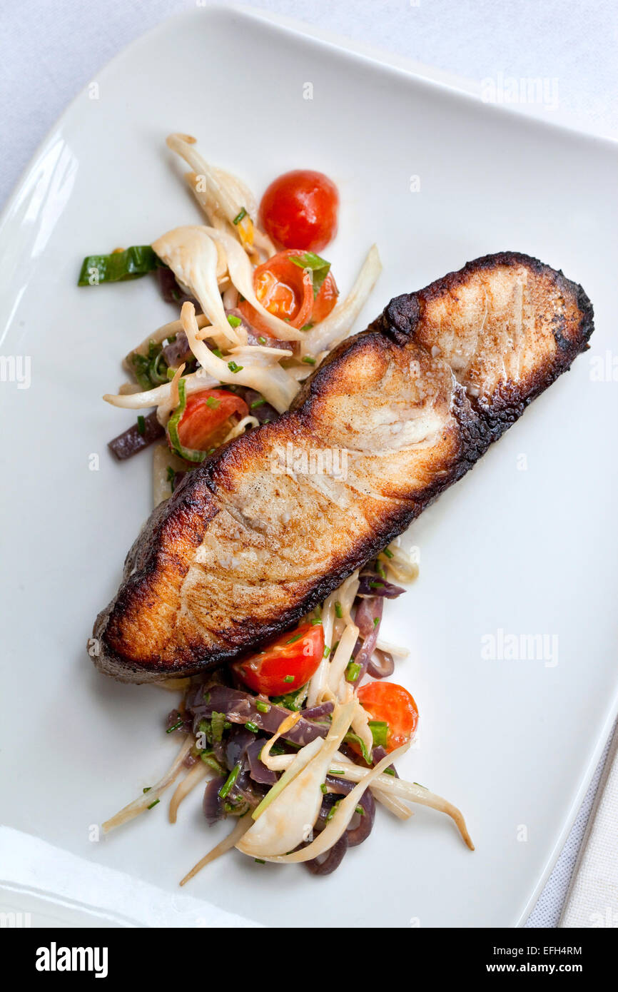 Roasted salmon and vegetable on a plate Stock Photo