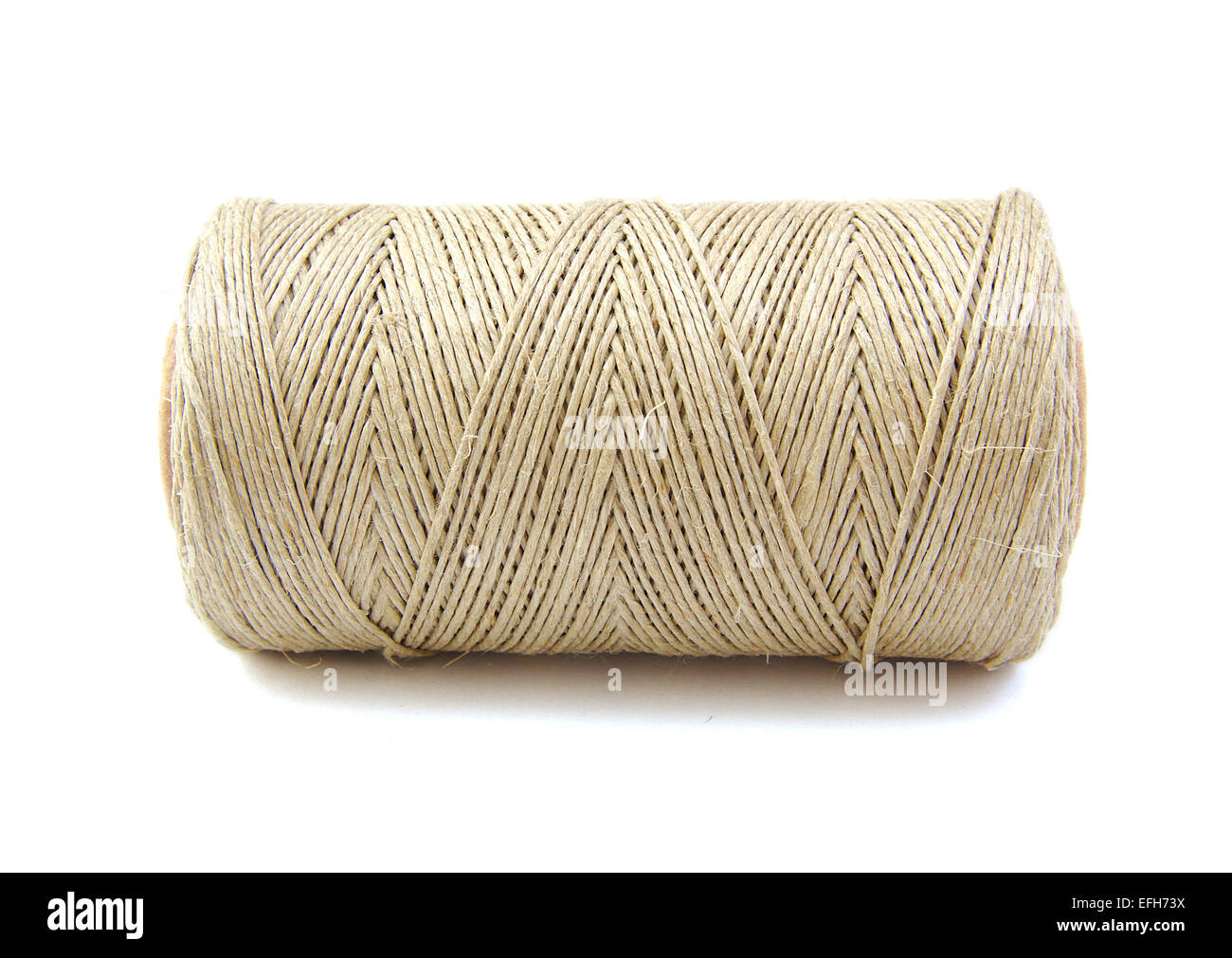 Roll of twine cord on a white background Stock Photo