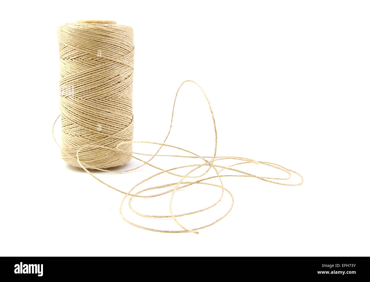 Roll of twine cord on white background Stock Photo
