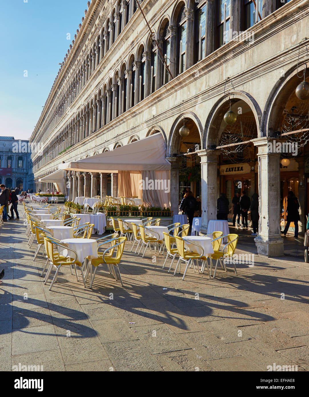 Alfresco tables and chairs In Piazza San Marco Venice Veneto Italy Europe Stock Photo