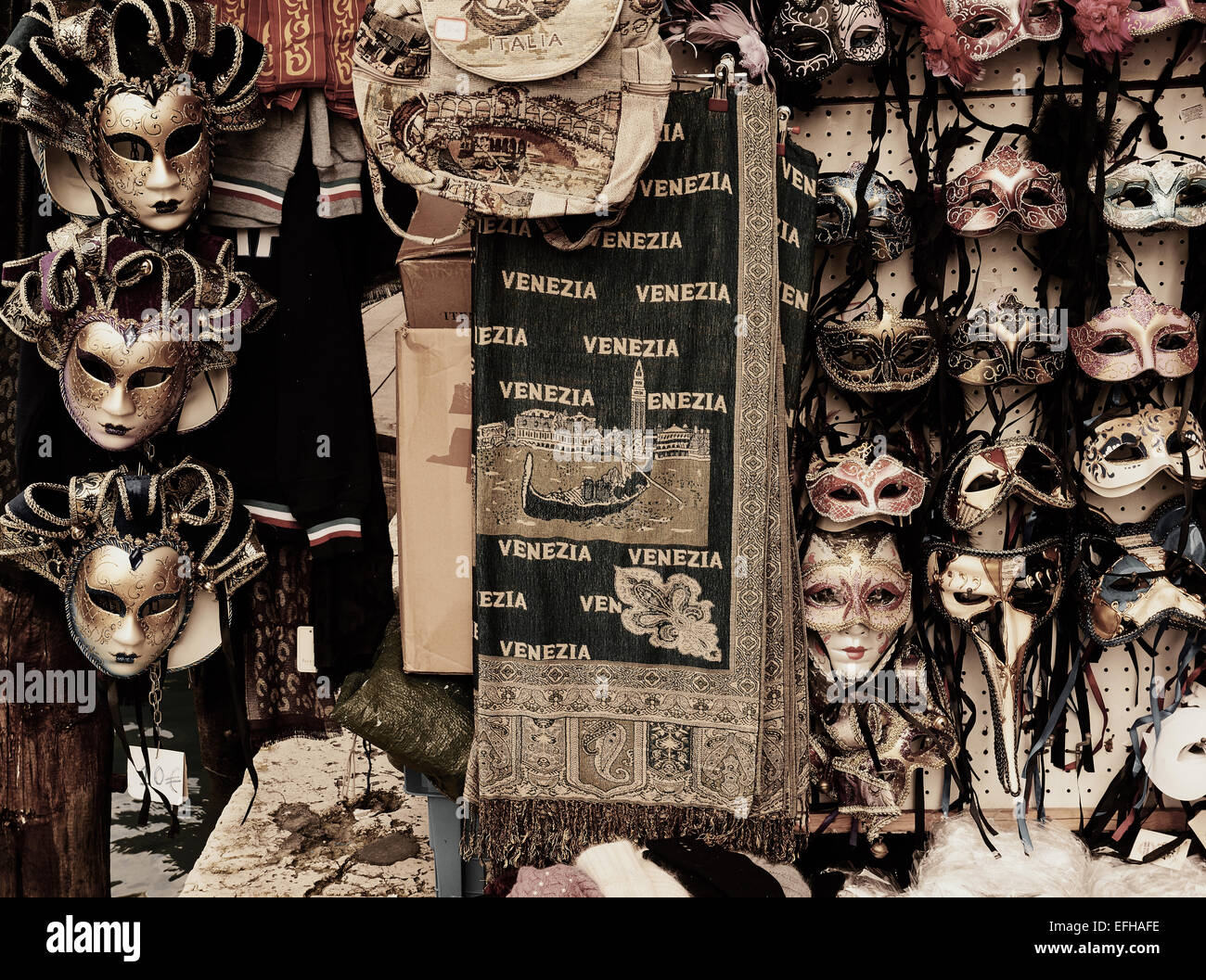 Decorative glitter covered traditional carnival masks on stall Venice Veneto Italy Europe Stock Photo