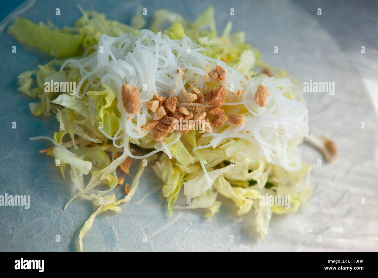 Mixed salad with cabbage, noodles and peanuts Stock Photo Alamy