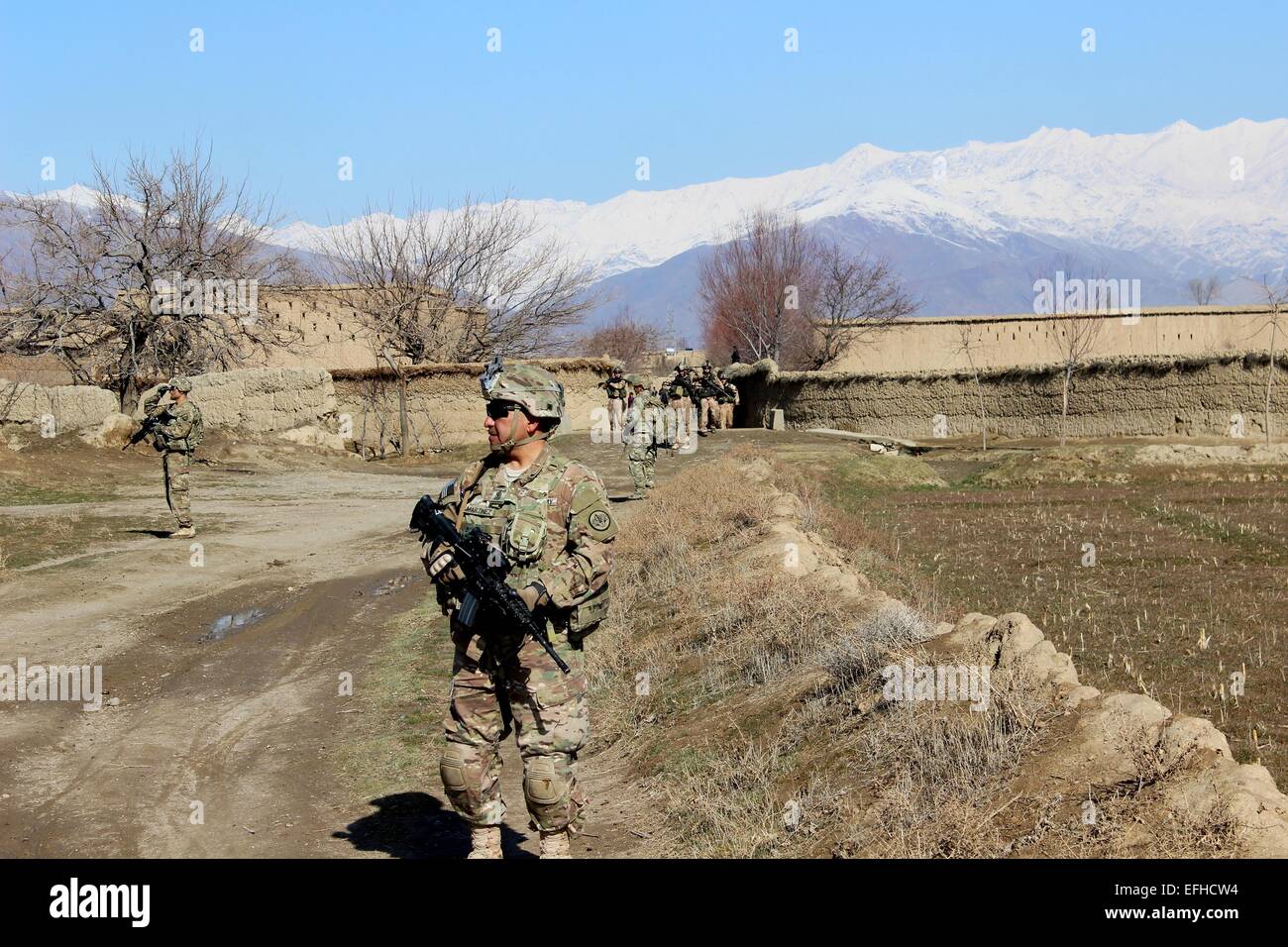 American soldiers patrol village hi-res stock photography and images ...