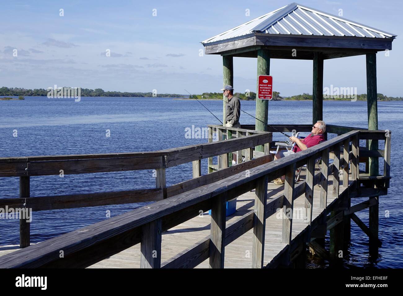 Fishermen at the dock in Bicentennial Park, Ormond Beach, Florida Stock Photo