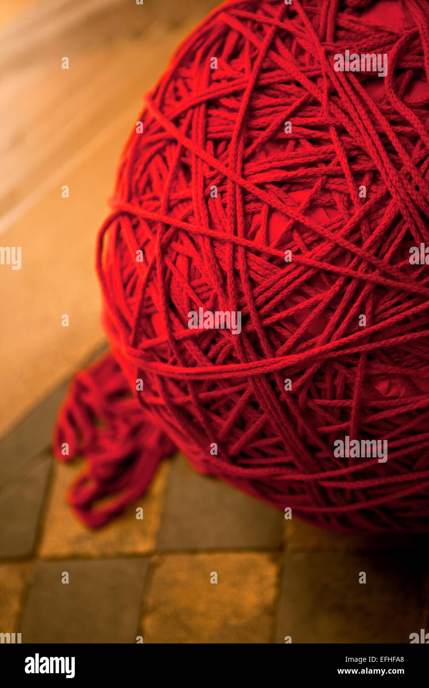 Big red ball of yarn Stock Photo Alamy
