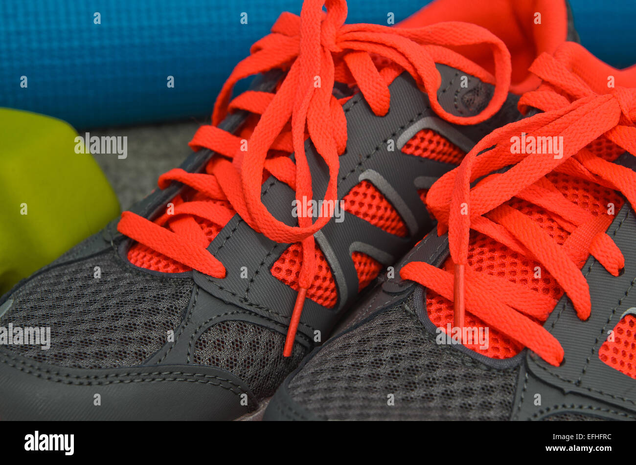 Bright orange and gray sport shoes Stock Photo - Alamy