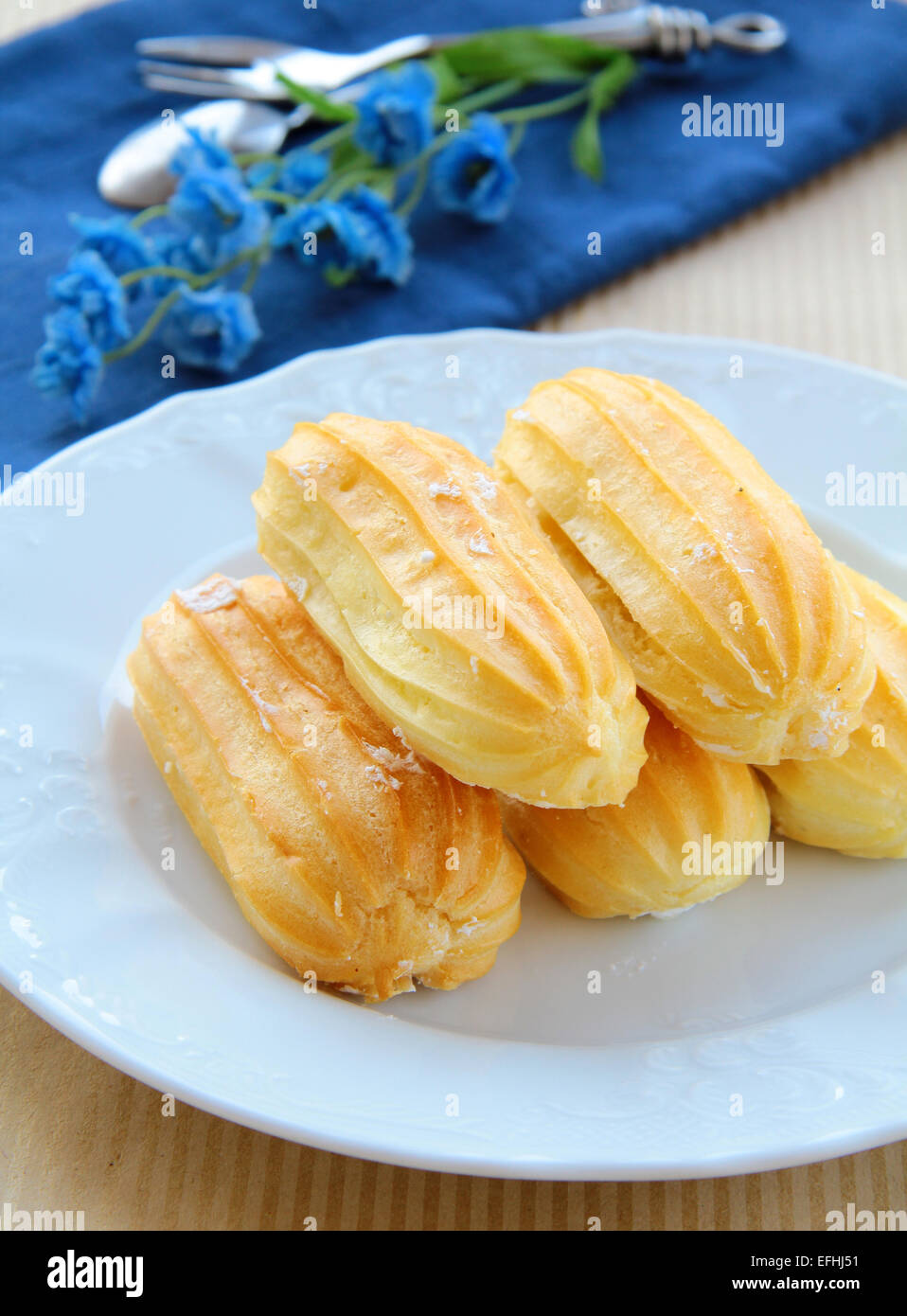 choux pastry dough eclairs with vanilla cream Stock Photo Alamy