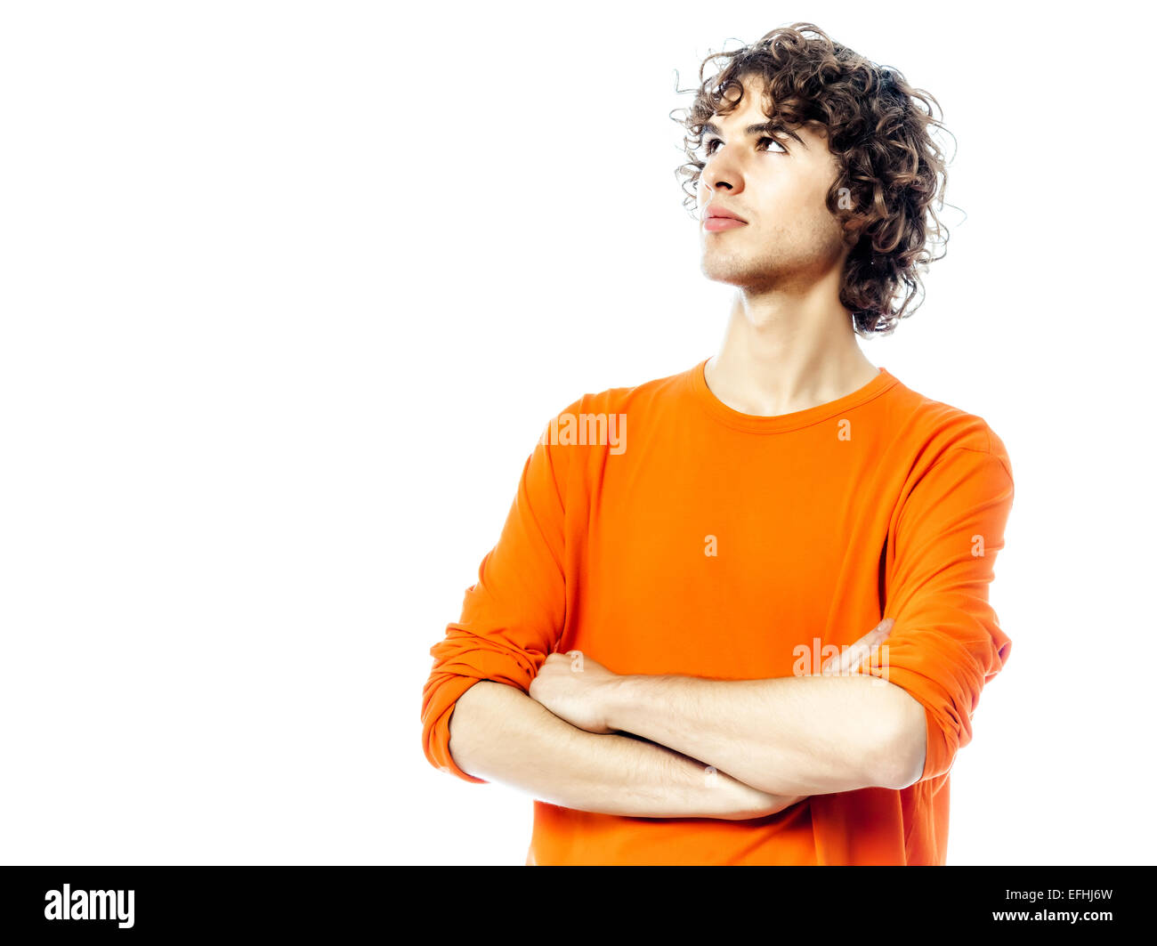 one young man  looking up portrait in studio white background Stock Photo