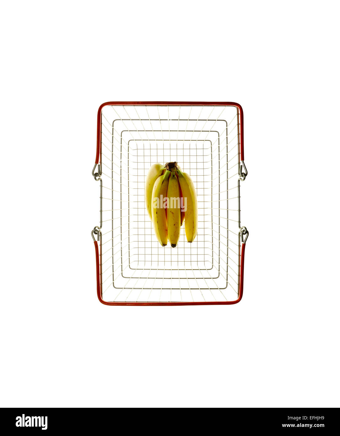 Shopping basket with bananas on a white background Stock Photo