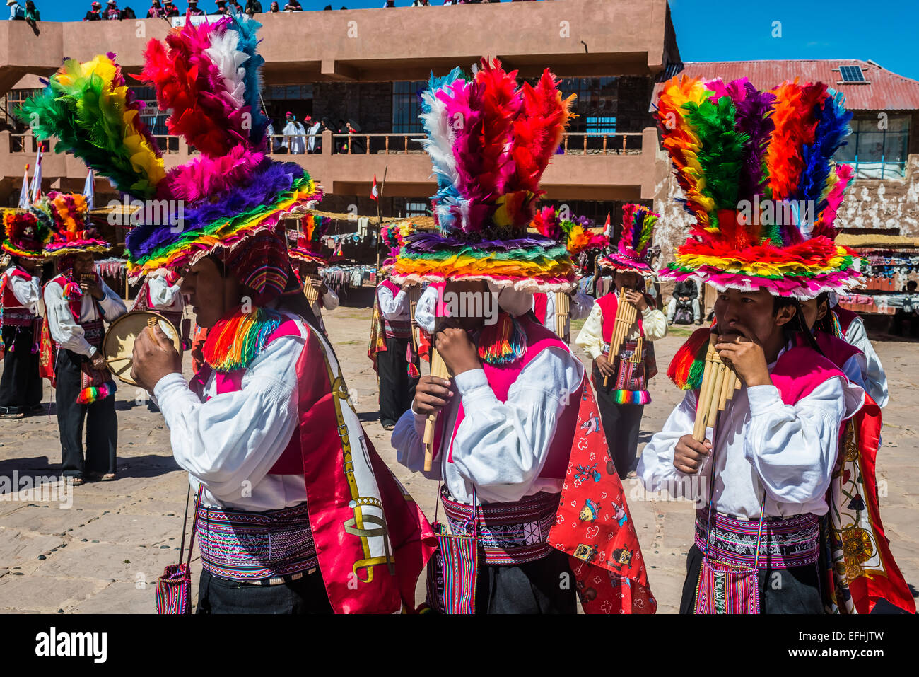 Puno, Peru - July 25, 2013: musicians and dancers in the peruvian Andes at Taquile Island on Puno Peru at july 25th, 2013. Stock Photo