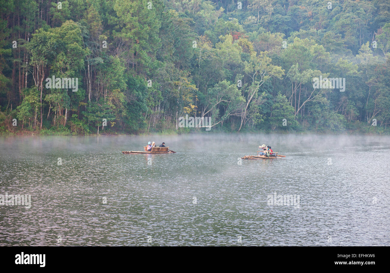 bamboo rafts in the morning mist, Pang Ung Lake, Mae Hong Son, Thailand Stock Photo