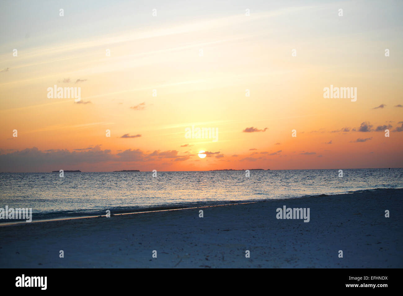 sunset on the sea beach Stock Photo - Alamy