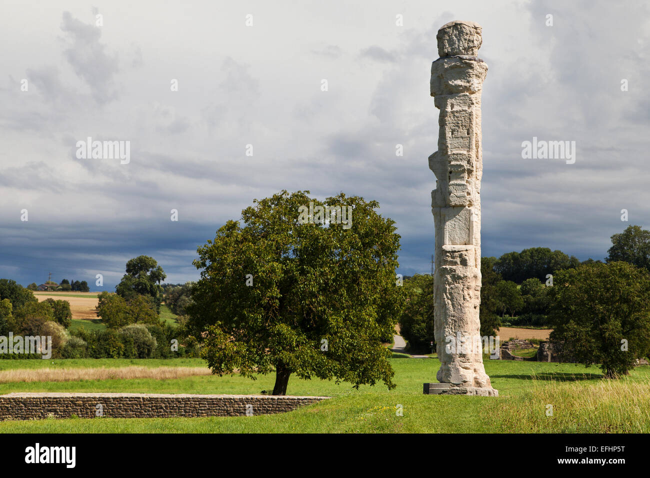 Ruined pillar of the ancient temple of Cigognier in Avenches, Switzerland. Stock Photo