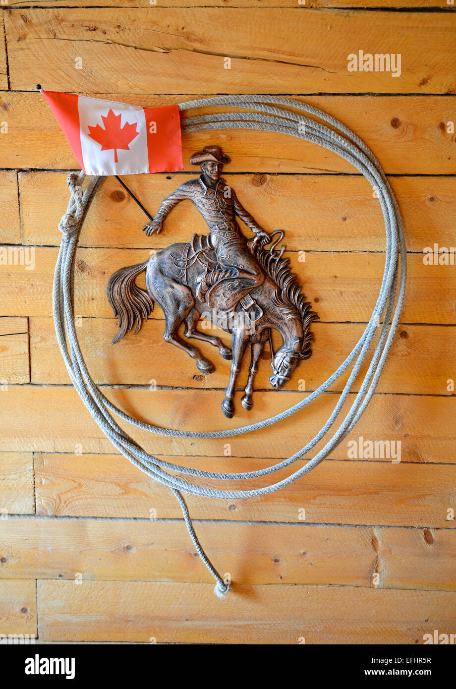 Cowboy lasso, lariat, Canada flag at La Reata Ranch, Saskatchewan, Canada. Stock Photo
