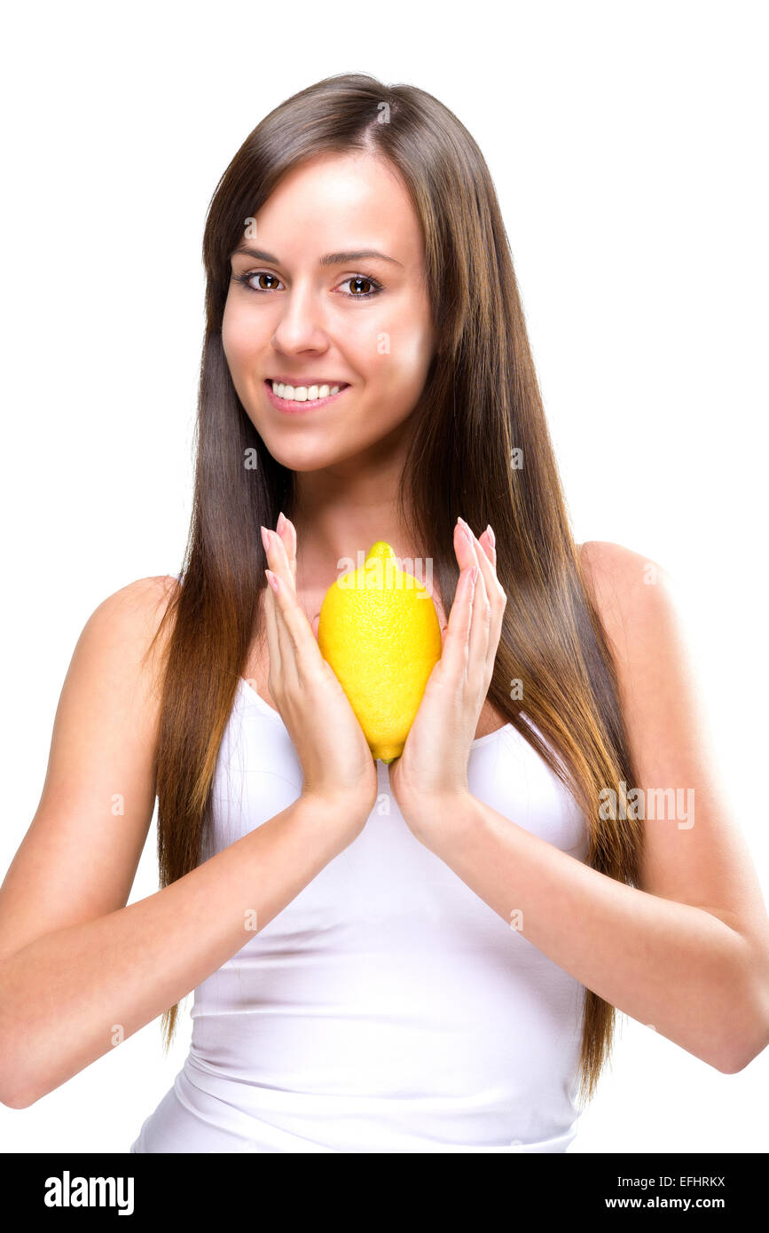 Healthy lifestyle - Beautiful pretty woman with lemon in hand Stock Photo