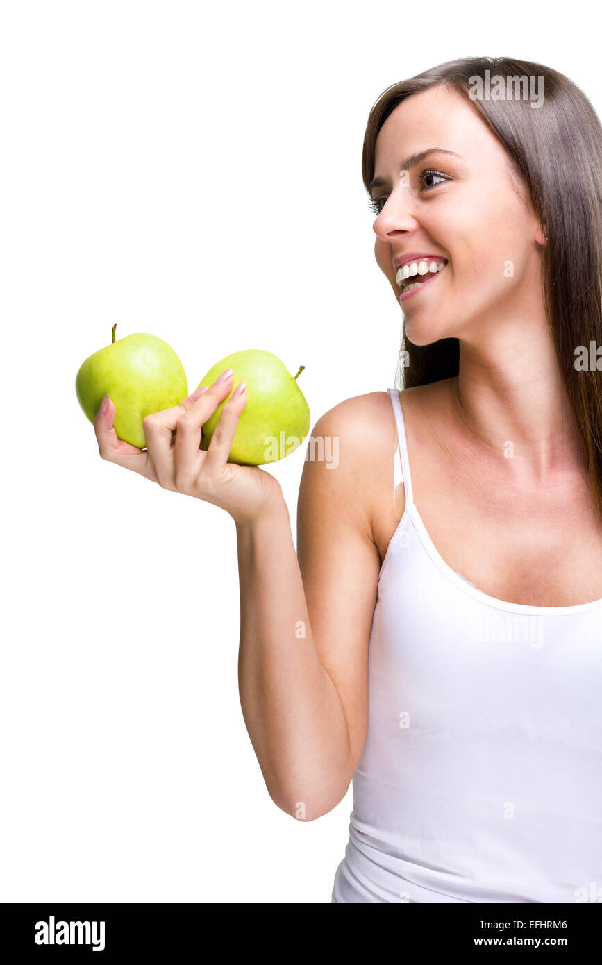 Healthful eating-Lovely woman holding an apple while laughing Stock Photo