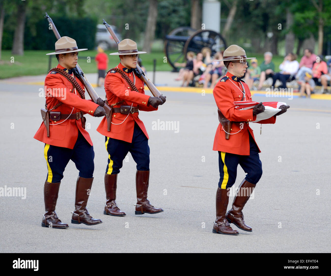Mounties carry the Canadian flag, Royal Canadian Mounted Police Depot, RCMP training academy in Regina, Saskatchewan, Canada Stock Photo