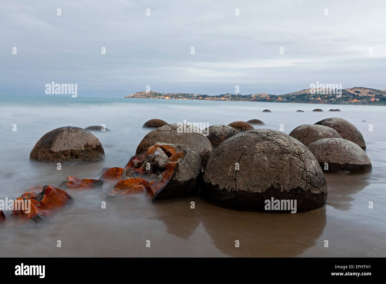 Moeraki Boulders, large, spherical concretions on the beach, stone ball, Moeraki, Otago, South Island, New Zealand Stock Photo
