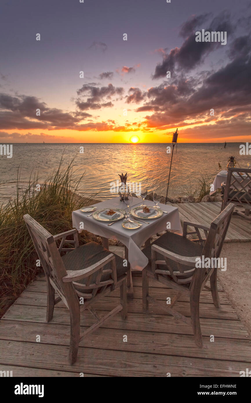Restaurant DINING ROOM at sunset, Little Palm Island Resort, Florida Keys, USA Stock Photo