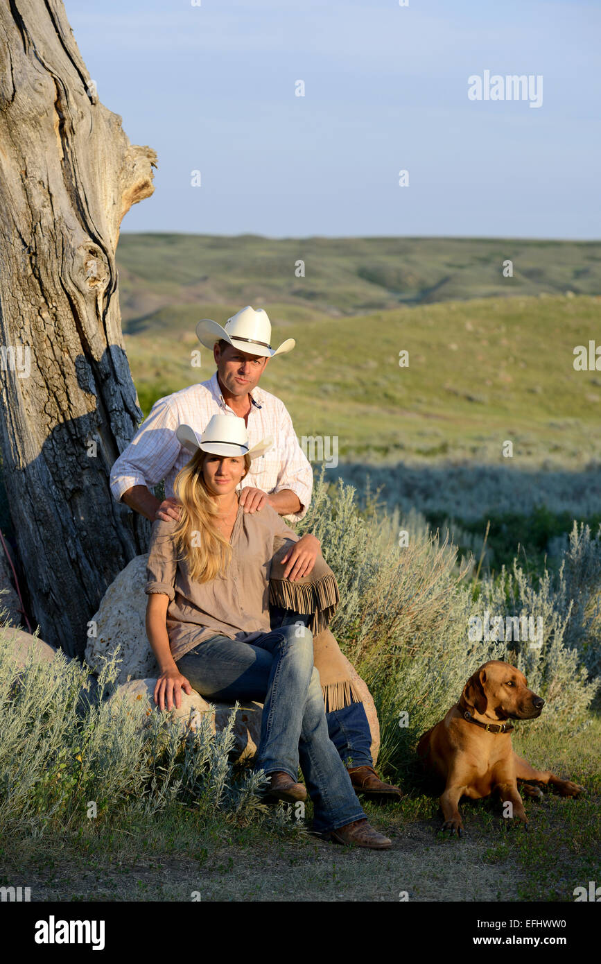 Cowboy and cowgirl, Canadian Prairies, Saskatchewan, Canada Stock Photo