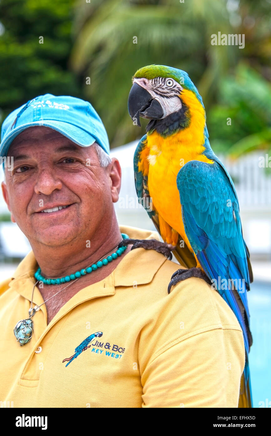 Local bird entertainer Jim with his parrot Bob, Key West, Florida Keys