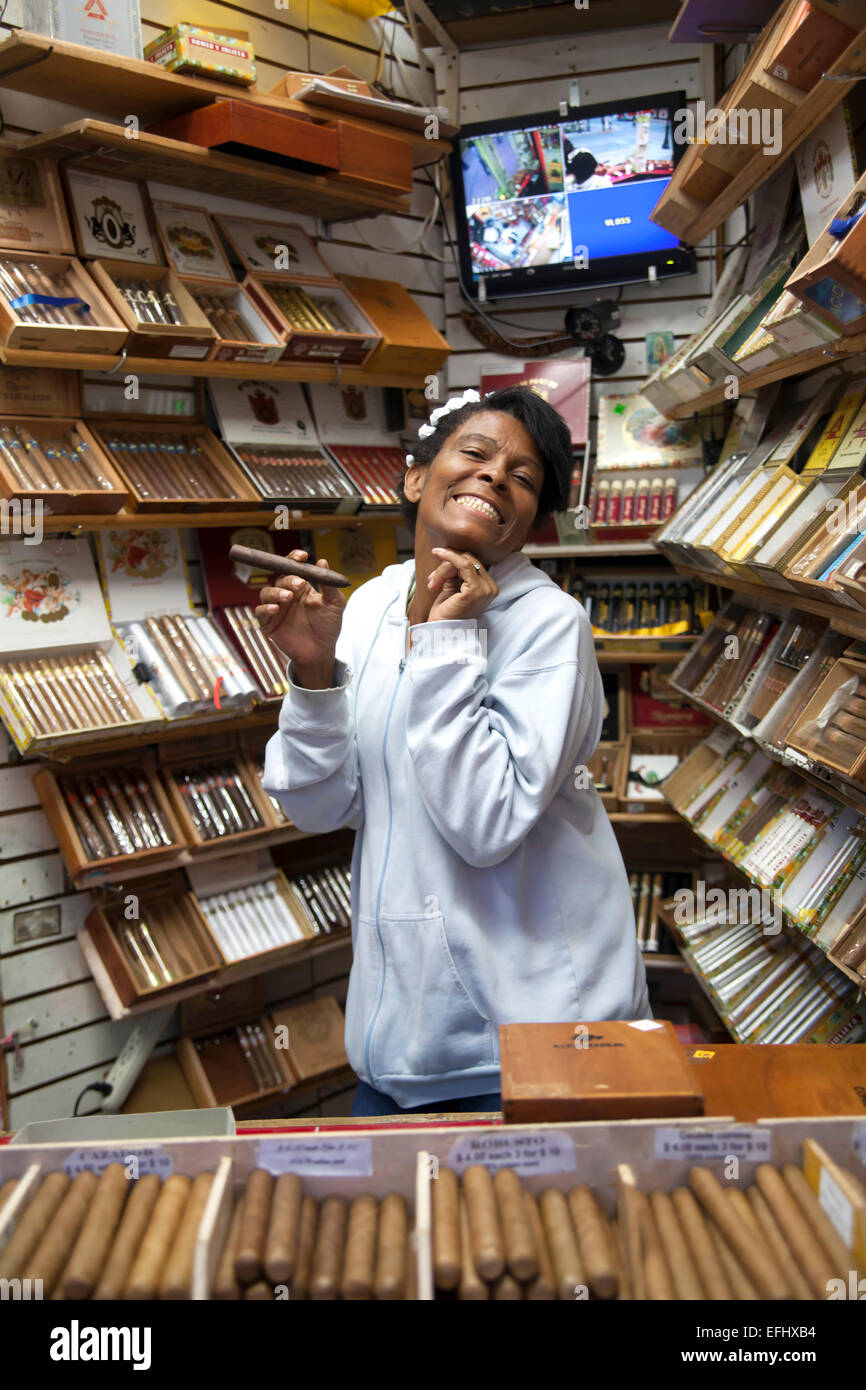 Woman selling cigars in a tobacco shop on Duval Street, Key West, Florida Keys, USA Stock Photo