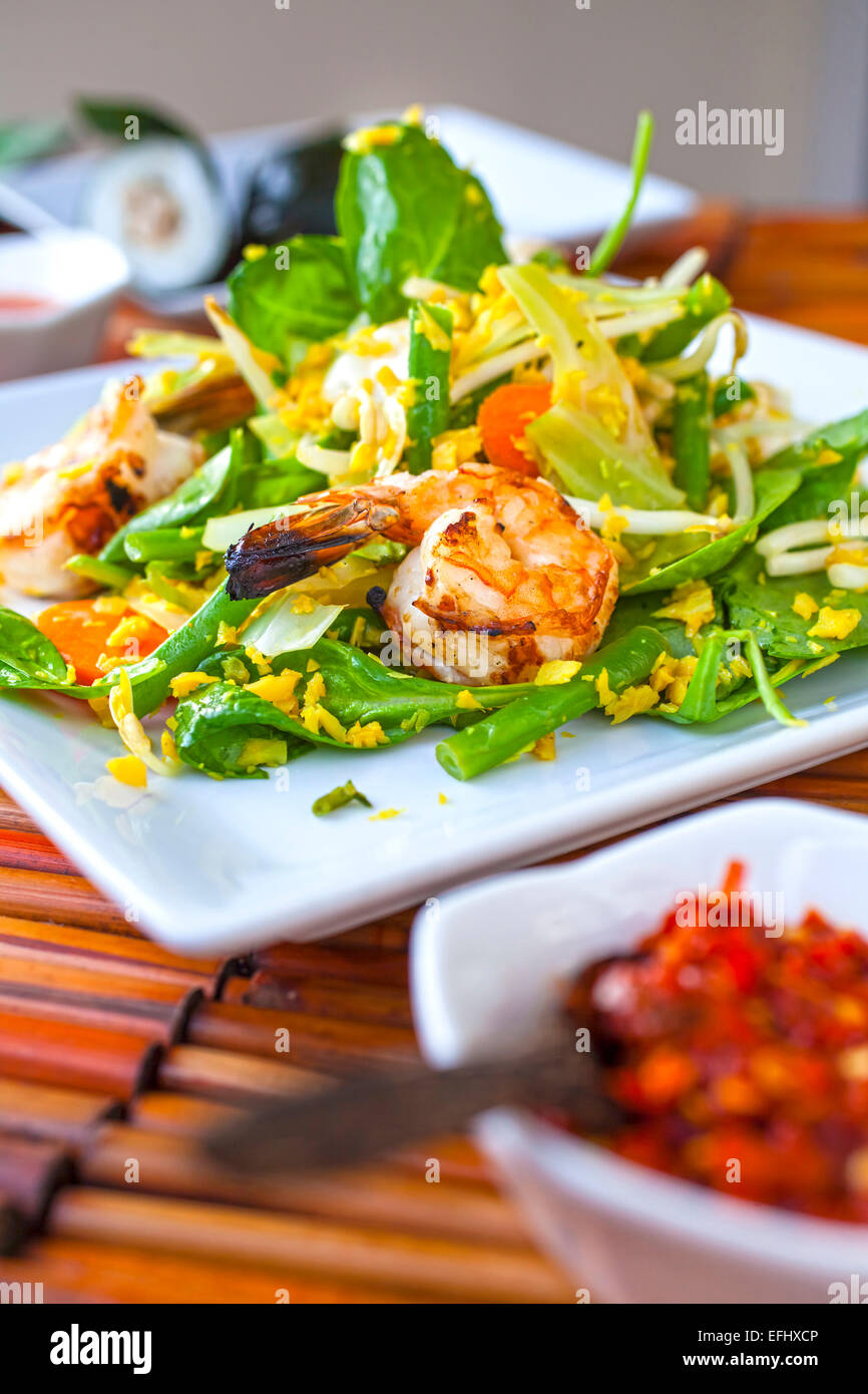 Urap Urap, Grilled shrimps marinated in Palm sugar and lime juice with salad of blenched vegetables, Restaurant Indomania, South Stock Photo